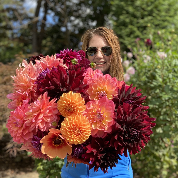 Christina Calhoun Thielen with a handful of dahlias